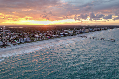 Aerial views from over Jacksonville Beach Florida and the intracoastal waterway at sunset