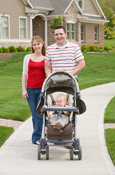 istock Family taking a walk with baby 148226054