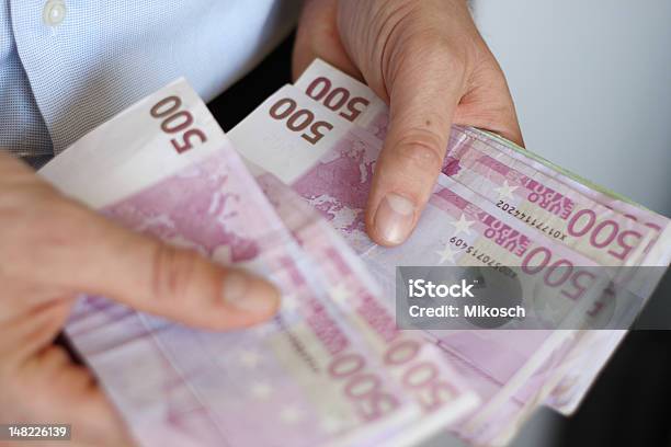 Counting Big Euros Stock Photo - Download Image Now - Abundance, Adult, Bringing Home The Bacon