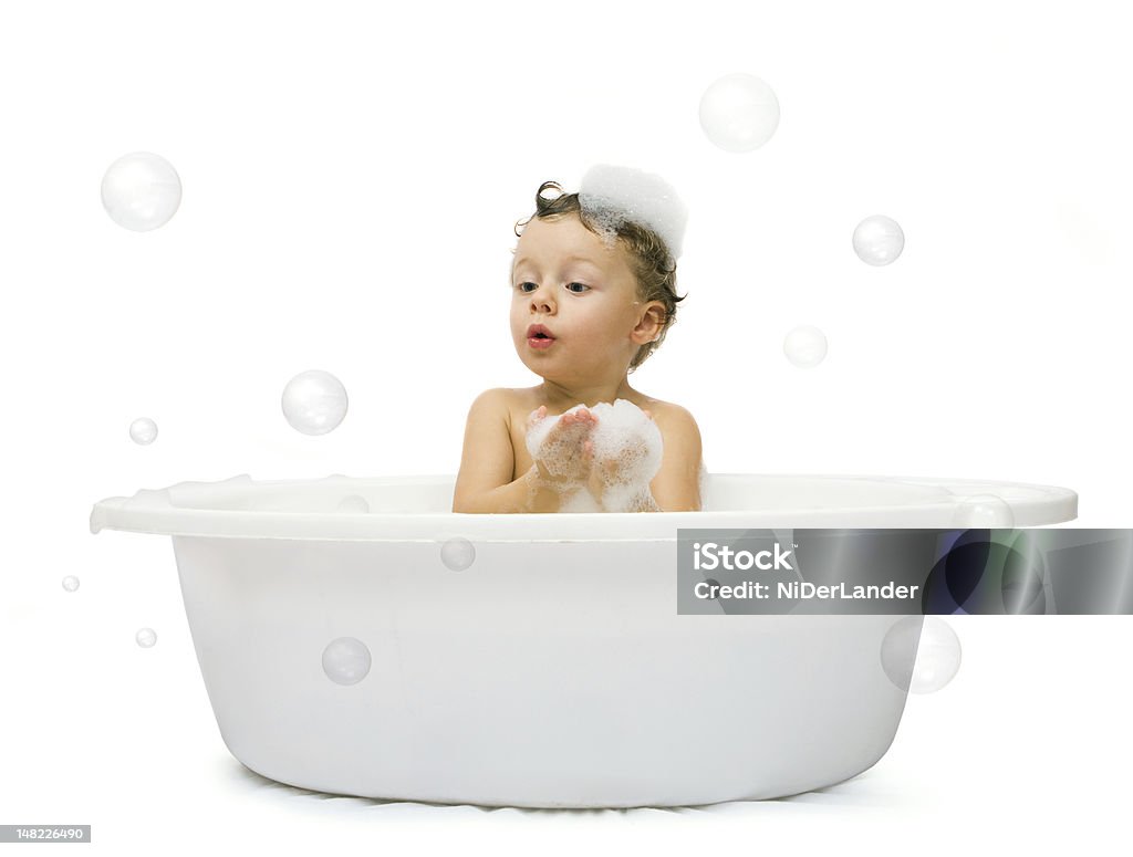 boy having bath Happy small boy having bath. Isolated over white Soap Sud Stock Photo