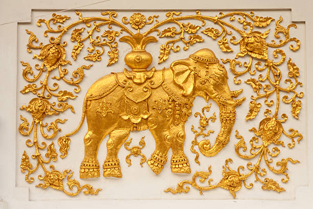 Elephant in fairy tale in traditional Thai style art, taken at wall of church of Wat Klang Wiang, Chiang Rai province, north of Thailand. Generality in Thailand, any kind of art decorated in Buddhist church, temple pavilion, temple hall, monk's house etc. created with money donated by people to hire artist. They are public domain or treasure of Buddhism, no restrict in copy or use, no name of artist appear (but, if there is artist name, it only for tell who is the artist of work, not for copyright). This photo is taken under these conditions.