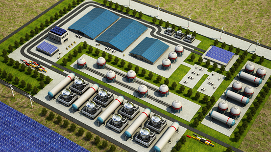 Industrial area with hydrogen tanks and containers where hydrogen power is stored and used in production. Alternative and clean energy, sustainability concept.