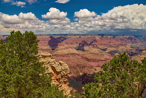 Panoramic view of storm clouds building above the Grand Canyon as seen from Mather Point in Arizona, USA.