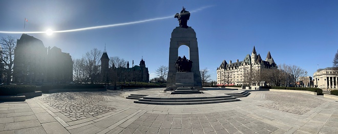 A panorama of the downtown Ottawa skyline featuring the Canadian War Memorial.