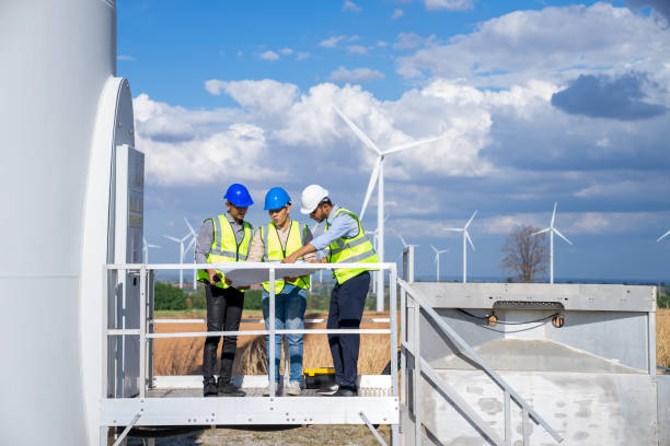 istock Engineer Technician brainstorming to inspect and maintenance wind turbine farm 1482279492