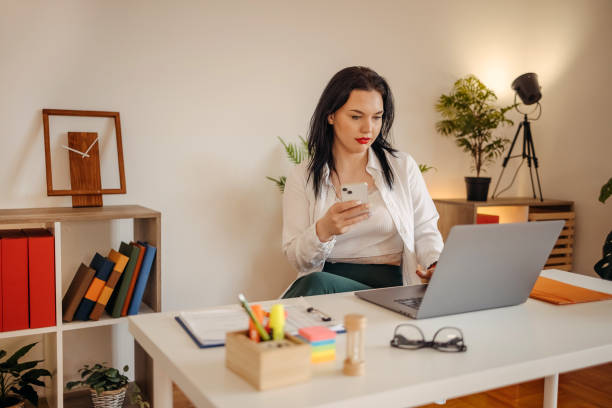 istock Young businesswoman working in the office 1482282472