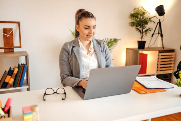 istock Young businesswoman working in the office 1482283114