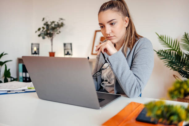 istock Young businesswoman working in the office 1482283216