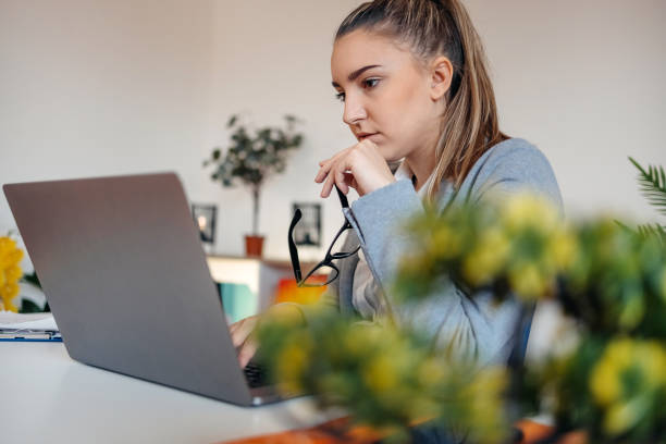 istock Young businesswoman working in the office 1482283217