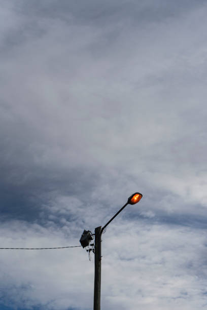istock Street lighting lantern with cloudy sky in the background 1482284376