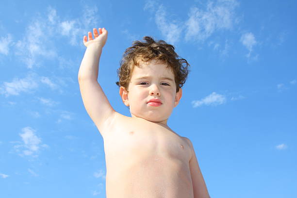Little boy outdoors stock photo