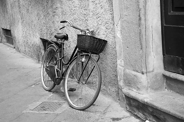 istock Old bicycle parked on street black and white 148228506