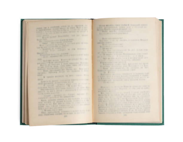 Old open hardcover book isolated on white, top view