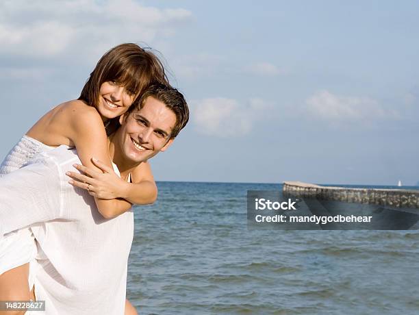 Piggyback Fun Stock Photo - Download Image Now - Adults Only, Affectionate, Bay of Alcudia