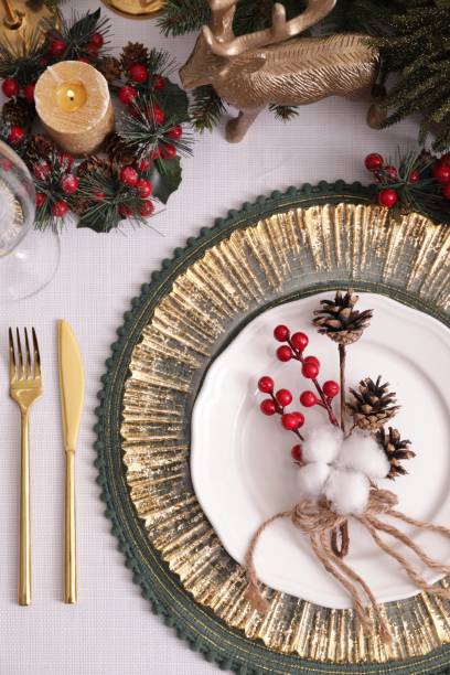 istock Luxury festive place setting with beautiful decor for Christmas dinner on white table, flat lay 1482286711