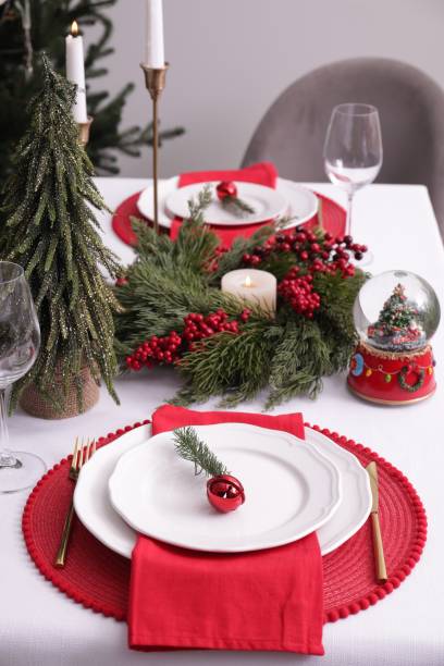 istock Luxury place setting with beautiful festive decor for Christmas dinner on white table 1482286737