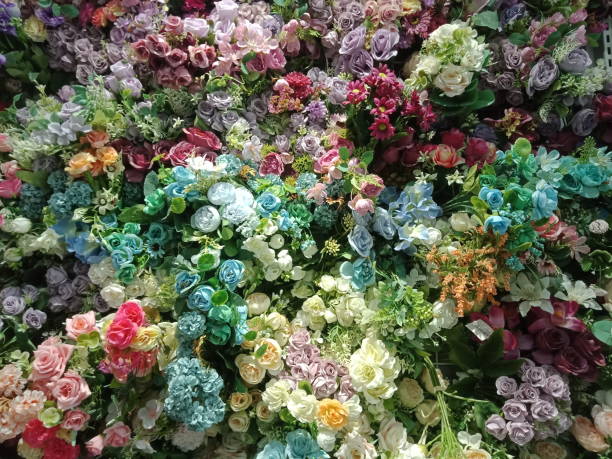istock Plastic flowers display on the department store 1482291606