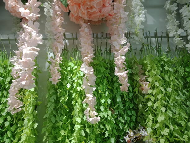 istock Plastic flowers display on the department store 1482291665