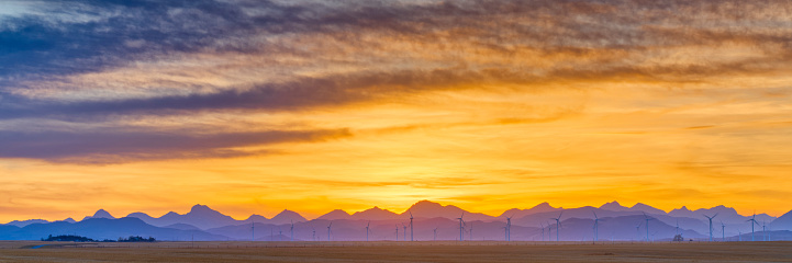 Sunset over a wind farm in rural Alberta Canada