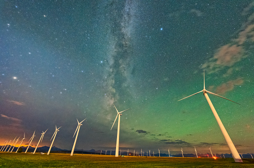 Star field over a wind farm in rural Alberta Canada