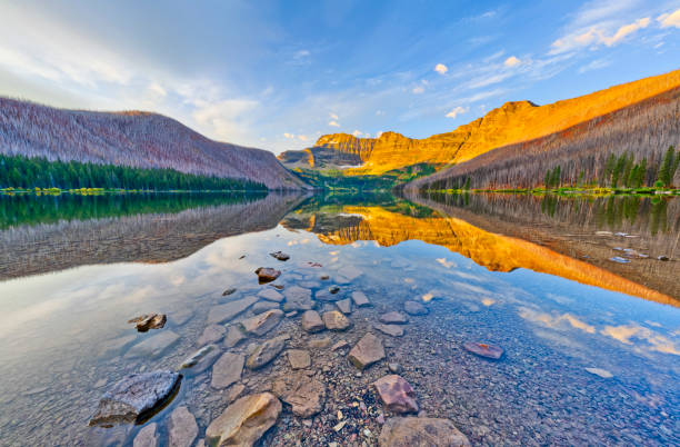 Waterton National Park in Alberta Canada Cameron Lake at sunrise in Waterton National Park located in Alberta Canada canadian rockies stock pictures, royalty-free photos & images
