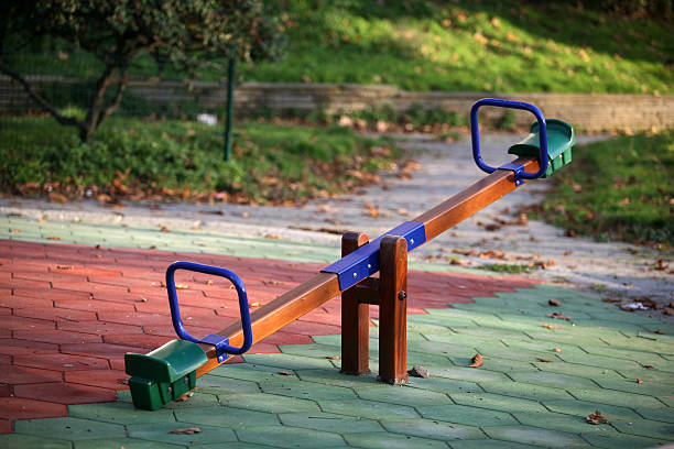 детские качели - seesaw стоковые фото и изображения