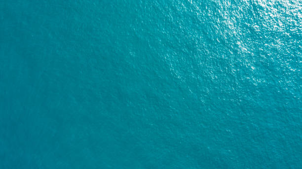 istock sea from drone. Ocean (water) Surface. water texture. Sea surface aerial view. 1482303819