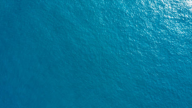 istock sea from drone. Ocean (water) Surface. water texture. Sea surface aerial view. 1482303824