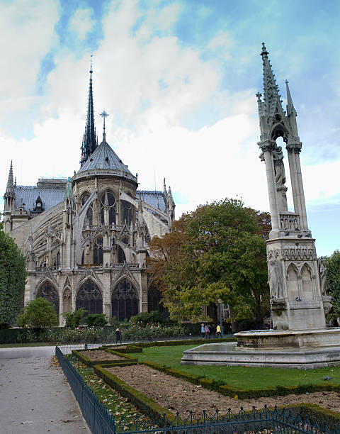 istock Backside of Notre Dame Cathedral and Statue 148230395