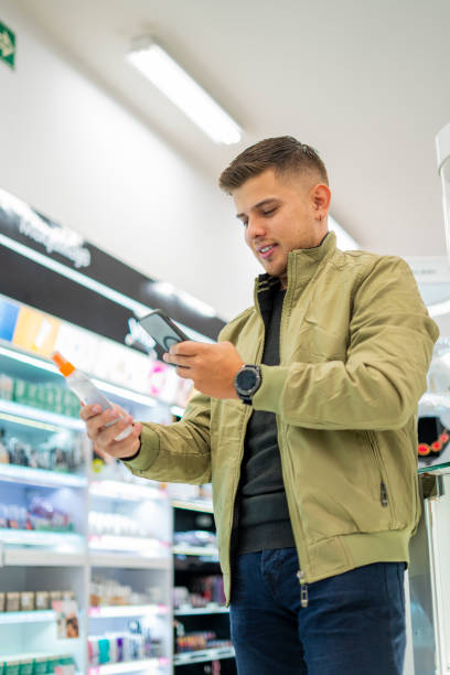 istock latino man is inside the store doing shopping for his care 1482312245
