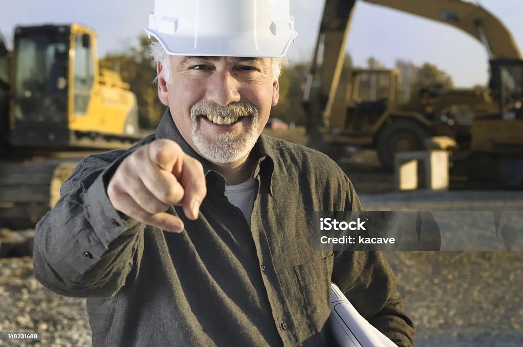 Trabajador de la construcción señalando - Foto de stock de 30-39 años libre de derechos