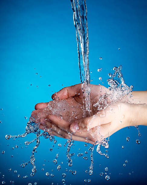 istock Hands and stream of water. 148232227