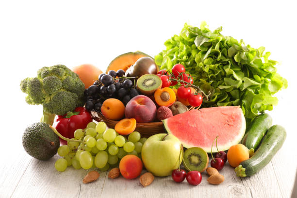 fresh fruits in wicker basket - fotografia de stock