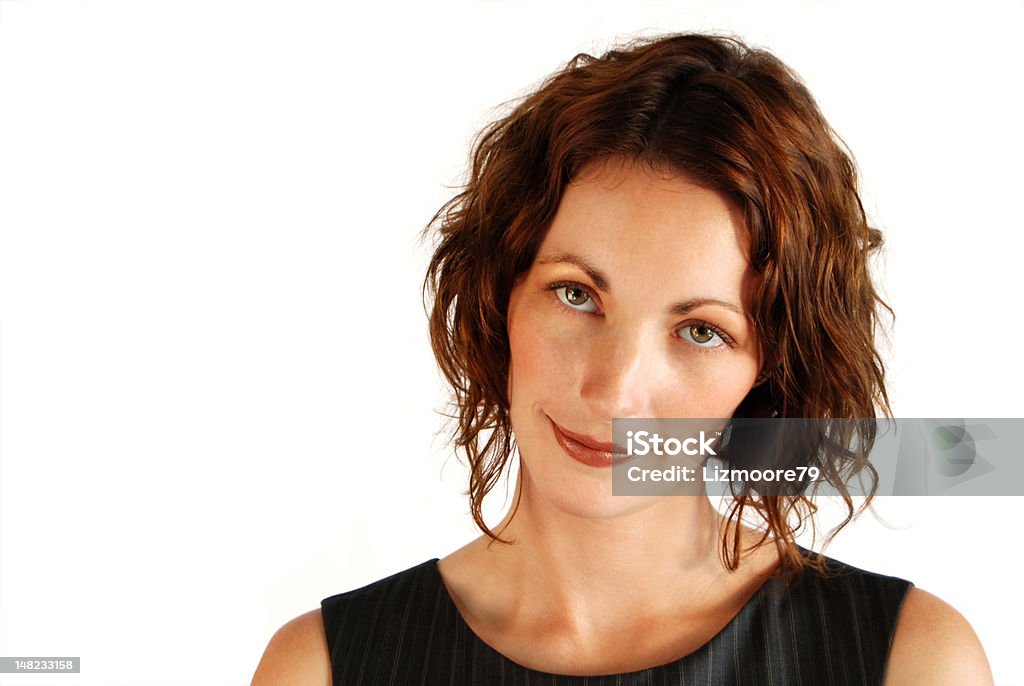 Business portrait Smiling portrait of an attractive business woman isolated on white. 25-29 Years Stock Photo