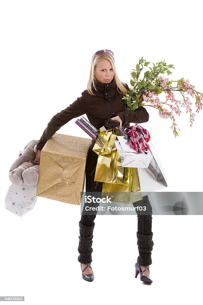 Christmas shopping Teenage girl loaded with various bags doing christmas shopping on white background 14-15 Years Stock Photo