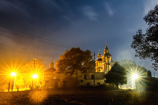 A Church at night with a light. San Miguel de las Casitas Xichu Guanajuato Mexico