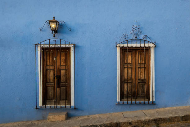 istock Blue Mexican old rustic house with a lamp in the front. 1482335903