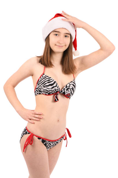 istock Young beautiful girl in a bathing suit isolated on a white background. 1482337761