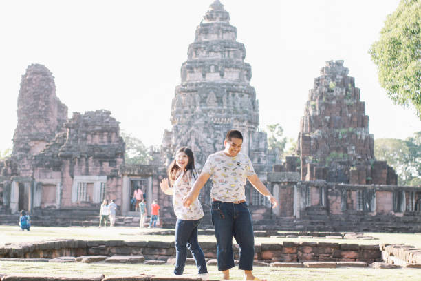 istock cute couple in Thailand temple 1482339663