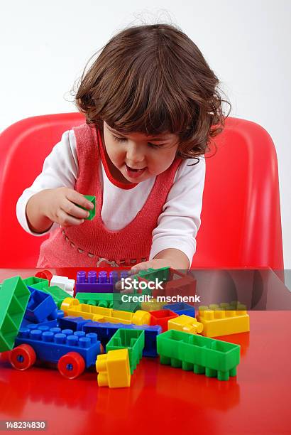 Child Playing With Block Stock Photo - Download Image Now - 2-3 Years, Armchair, Blue