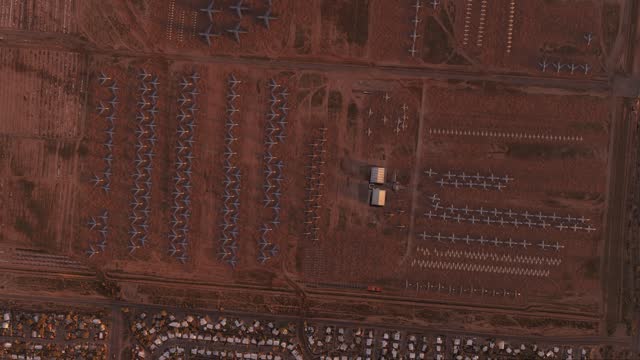 Drone View. Aerial Sunset View of Aircraft Graveyard or Airplane Boneyard in Arizona. United States