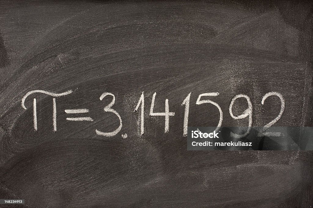 the number pi on a blackboard first seven digits of the number pi handwritten with white chalk on a blackboard Pi - Number Stock Photo