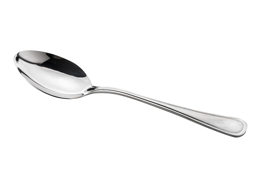 Shiny metal spoon isolated on white with clipping path included