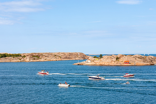 Hunnebostrand, Sweden-July, 2020: Leisure boats in a rocky archipelago in summer