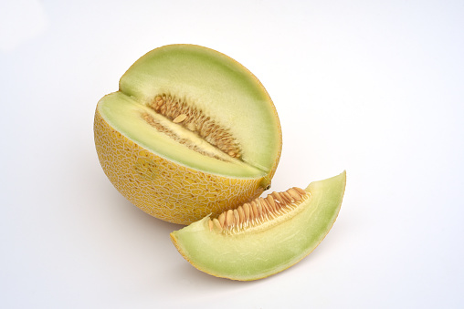 Galia melon, also known as the netted melon because of the structure on its yellow skin, has white to green