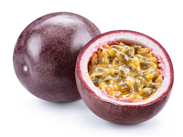 istock Dark purple passiflora or passion fruit and it's half on white background. File contains clipping path. 1482370856