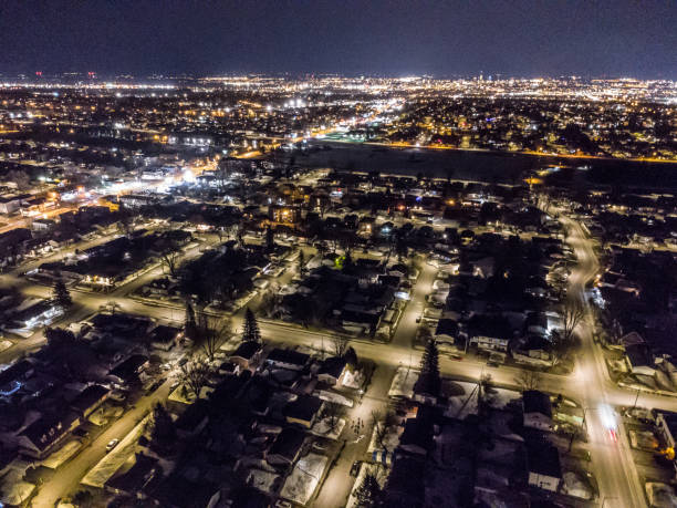 istock Aerial view of suburb by night 1482376494