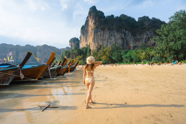 istock Cheerful woman on Railey beach in Krabi 1482385023