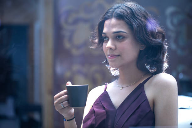istock Beautiful happy woman drinking coffee 1482385087