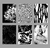 istock Grunge textures set. Abstract hand drawn backgrounds. Graphic elements: brush strokes, spots, stripes, ink splashes. Sketch monochrome vector illustrations isolated on white background. 1482385134